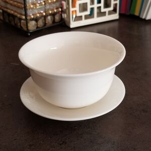 White Porcelain Tea Cup and Saucer